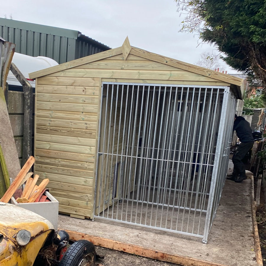 Outdoor kennel fitted in a London garden - stable base and secure door